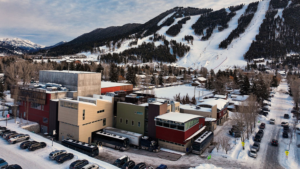 Aerial view of the Center for the Arts in Jackson, Wyoming with snow-covered Snow King Mountain in background